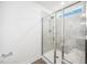 Modern bathroom featuring a tiled shower with glass door and built-in bench seating at 51 Duchess Ave, Franklinton, NC 27525