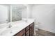 Double sink vanity with modern faucets and a large mirror in a bright bathroom at 51 Duchess Ave, Franklinton, NC 27525