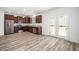 New kitchen with stainless steel appliances, dark cabinets, and access to the backyard at 51 Duchess Ave, Franklinton, NC 27525