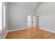 Spacious bedroom with vaulted ceilings and hardwood flooring at 6 Castlewood Dr, Durham, NC 27713