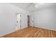 Spacious bedroom adjacent to a clean white tiled bathroom at 6 Castlewood Dr, Durham, NC 27713