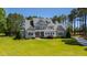 Beautifully landscaped home with a spacious lawn and elegant architecture at 6 Castlewood Dr, Durham, NC 27713