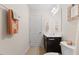 Cozy bathroom with a modern vanity, stylish mirror, and coordinated towels creating a clean aesthetic at 608 Grand Central Sta, Apex, NC 27502