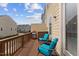 Relax on this charming deck with comfortable chairs and a table, perfect for enjoying the outdoors at 608 Grand Central Sta, Apex, NC 27502