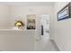 Hallway view includes a laundry area with appliances and a decorated hallway at 608 Grand Central Sta, Apex, NC 27502