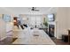 Comfortable living room with fireplace, plush seating, and abundant natural light at 608 Grand Central Sta, Apex, NC 27502