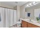 Well-lit bathroom with shower and vanity with under sink storage at 625 Canvas Dr, Wake Forest, NC 27587