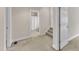 Bright bedroom with neutral walls leading to an adjacent bathroom at 625 Canvas Dr, Wake Forest, NC 27587