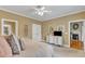 Comfortable main bedroom with a king-size bed, ensuite bath, and ample closet space at 625 Canvas Dr, Wake Forest, NC 27587