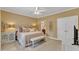 Serene main bedroom featuring neutral tones, a king bed, and an ensuite bathroom at 625 Canvas Dr, Wake Forest, NC 27587