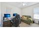 Cozy home office with plush seating and plenty of natural light at 6904 Fox Haven Pl, Raleigh, NC 27616