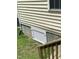 Exterior crawl space access provides convenient maintenance access at 6904 Fox Haven Pl, Raleigh, NC 27616