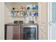 Convenient laundry room equipped with washer, dryer, and built-in shelving at 6904 Fox Haven Pl, Raleigh, NC 27616