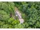 Stunning aerial view of a home nestled among lush greenery at 8232 Glynmorgan Way, Chapel Hill, NC 27516