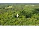 Wonderful house surrounded by a forest in aerial shot with an arrow to point it out at 8232 Glynmorgan Way, Chapel Hill, NC 27516