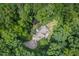 Beautiful aerial view of house surrounded by mature trees and foliage at 8232 Glynmorgan Way, Chapel Hill, NC 27516