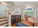 Inviting foyer boasts hardwood floors, elegant staircase, and seamless flow into the living area at 8232 Glynmorgan Way, Chapel Hill, NC 27516