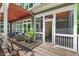 Screened porch with comfortable seating and views of nature, perfect for relaxation at 8232 Glynmorgan Way, Chapel Hill, NC 27516