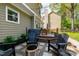 Multi-level backyard with a hot tub, patio seating, and a fire pit, creating a perfect outdoor retreat at 8613 Swarthmore Dr, Raleigh, NC 27615