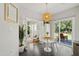Cozy breakfast nook off the kitchen with natural light and sliding glass door to the backyard at 8613 Swarthmore Dr, Raleigh, NC 27615
