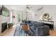 Inviting living room featuring a fireplace, comfortable couch, and lots of light at 8613 Swarthmore Dr, Raleigh, NC 27615