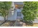 Charming entrance with white trim, a glass-paned door, and a small welcome mat at 917 Saint Marys St, Raleigh, NC 27605