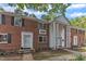Classic brick building with white-columned entrances creating a welcoming facade at 917 Saint Marys St, Raleigh, NC 27605