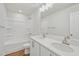 Bathroom shows double vanity, mirror, tub and shower combo, and toilet at 919 Montague Ave, Durham, NC 27703