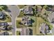 Aerial view of homes in a neighborhood with well-manicured lawns, and backyard fencing at 94 Pearsall Farm Ln, Clayton, NC 27527