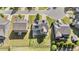 Aerial view showcasing the property's location within a community with fenced yards and tidy streets at 94 Pearsall Farm Ln, Clayton, NC 27527