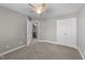 Bedroom featuring carpet flooring and access to an ensuite bathroom at 94 Pearsall Farm Ln, Clayton, NC 27527