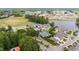 Aerial showcasing the neighborhood's clubhouse, pool, tennis courts, and soccer field at 94 Pearsall Farm Ln, Clayton, NC 27527