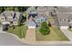 Inviting two-story home featuring a well-manicured lawn, solar panels and a two car garage at 94 Pearsall Farm Ln, Clayton, NC 27527