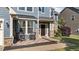 Charming front porch with stone accents and cozy seating area at 94 Pearsall Farm Ln, Clayton, NC 27527