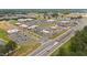 Aerial shot of nearby shopping center with various businesses and ample parking at 94 Pearsall Farm Ln, Clayton, NC 27527