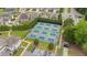 An aerial view features well-maintained community tennis and pickleball courts at 94 Pearsall Farm Ln, Clayton, NC 27527