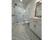 Bathroom featuring tiled floors, glass shower, and white vanity at 976 Knob Hill Dr., Hillsborough, NC 27278