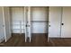Spacious walk-in closet with shelving and hardwood floors at 976 Knob Hill Dr., Hillsborough, NC 27278