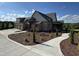 Beautiful two-story brick home with manicured landscaping and a spacious three car garage at 976 Knob Hill Dr., Hillsborough, NC 27278