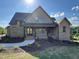 Charming brick home with manicured landscaping and inviting entrance at 976 Knob Hill Dr., Hillsborough, NC 27278
