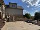 Stone patio with a built-in fire pit and backyard access at 976 Knob Hill Dr., Hillsborough, NC 27278