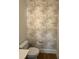 Charming powder room features designer floral wallpaper and modern fixtures at 976 Knob Hill Dr., Hillsborough, NC 27278