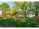 Spacious backyard with a play set and storage shed, great for Gathering fun at 1003 E Club Blvd, Durham, NC 27704