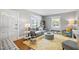 Bright living room with cozy seating, natural light, and a welcoming atmosphere at 1003 E Club Blvd, Durham, NC 27704
