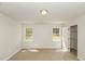 Bedroom featuring two windows providing natural light and a closet with plenty of storage space at 1003 Walnut Dr, Erwin, NC 28339