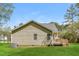 Home exterior showcasing siding, a deck, and a well-maintained lawn at 1003 Walnut Dr, Erwin, NC 28339