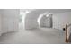 Large bonus room with carpet flooring, ceiling fans, and many storage options at 1007 Wellstone Cir, Apex, NC 27502