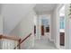 Hallway with carpeted floor and doors to adjacent rooms at 1007 Wellstone Cir, Apex, NC 27502