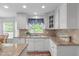 Kitchen featuring granite countertops, modern appliances, and ample storage at 1007 Wellstone Cir, Apex, NC 27502