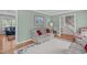 Comfortable living room with hardwood floors and a view into another room at 1007 Wellstone Cir, Apex, NC 27502